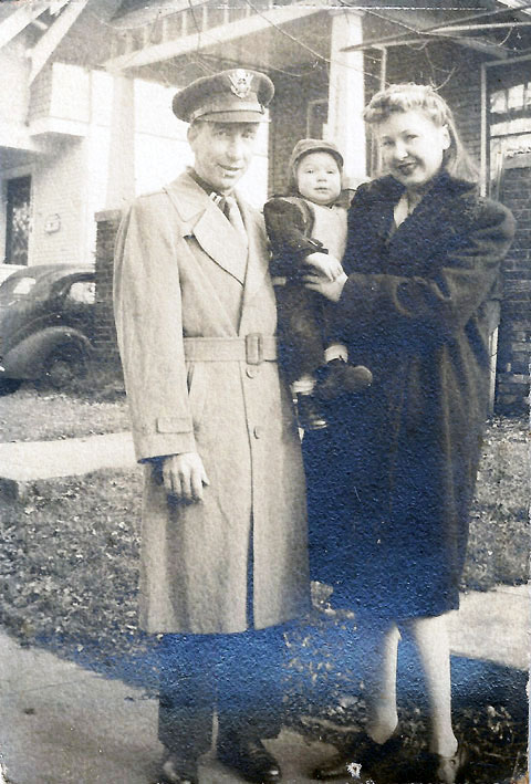 Capt. Clifford and wife Saidee Wood holding Walter D Wood